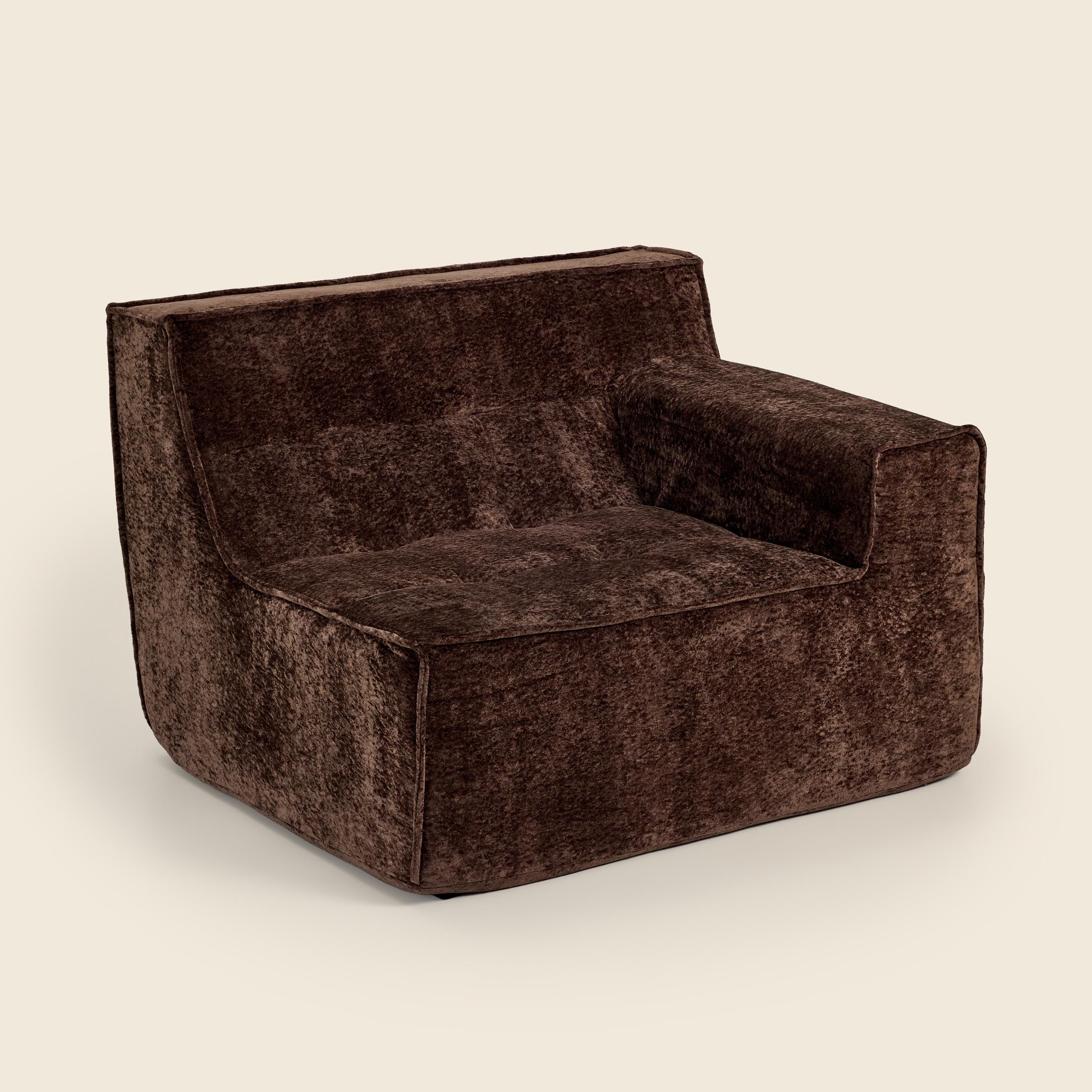 Brown textured armchair on a beige background