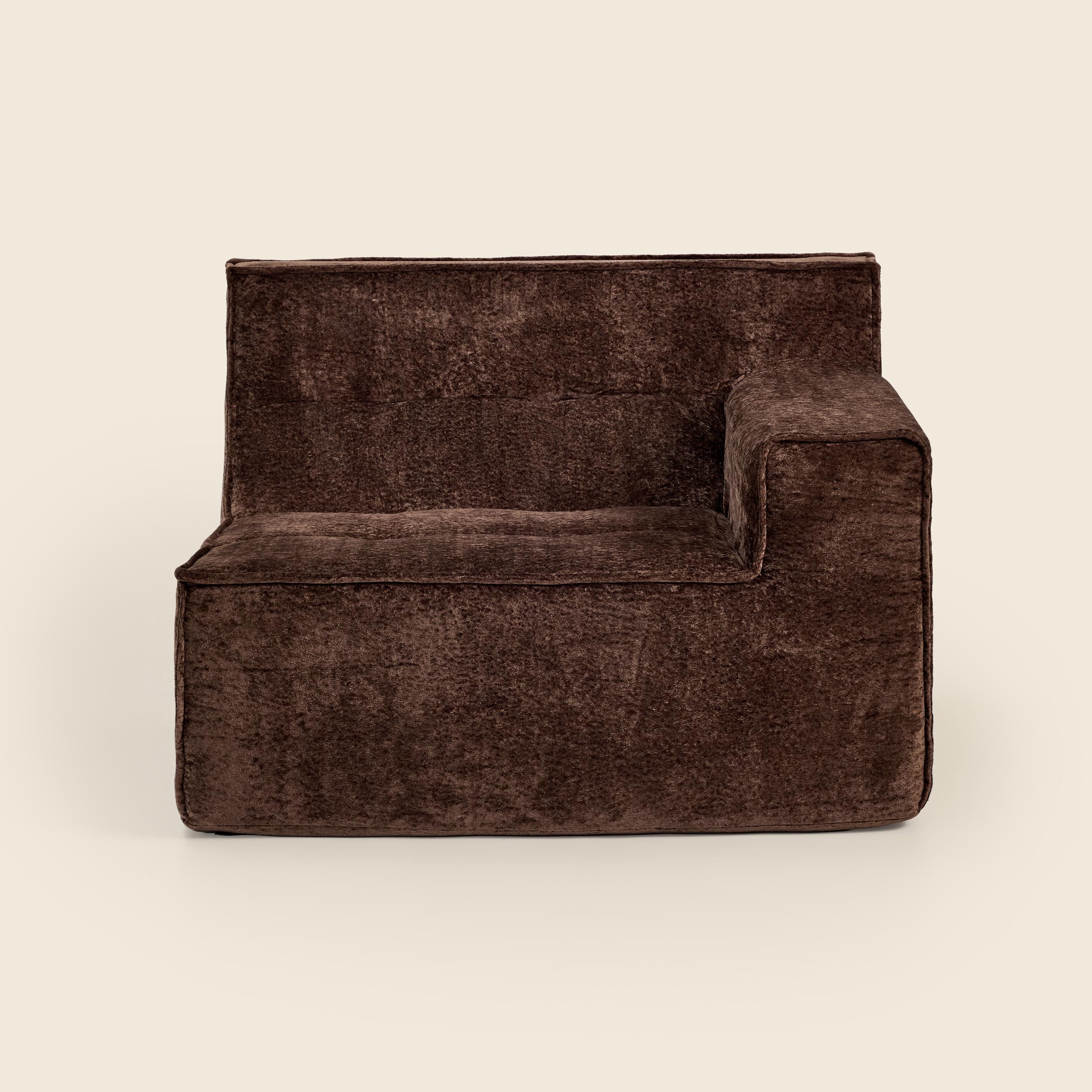 Brown textured armchair on a beige background