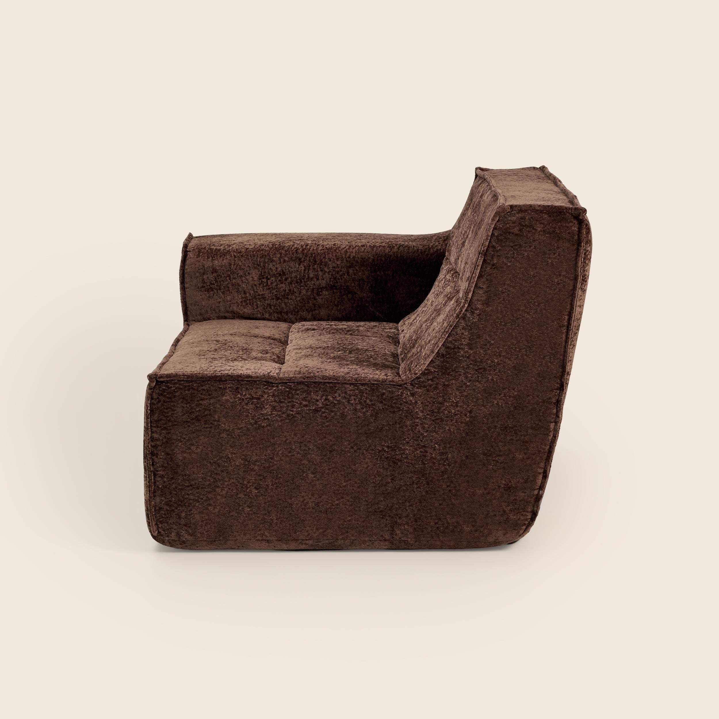 Brown upholstered chair on a beige background