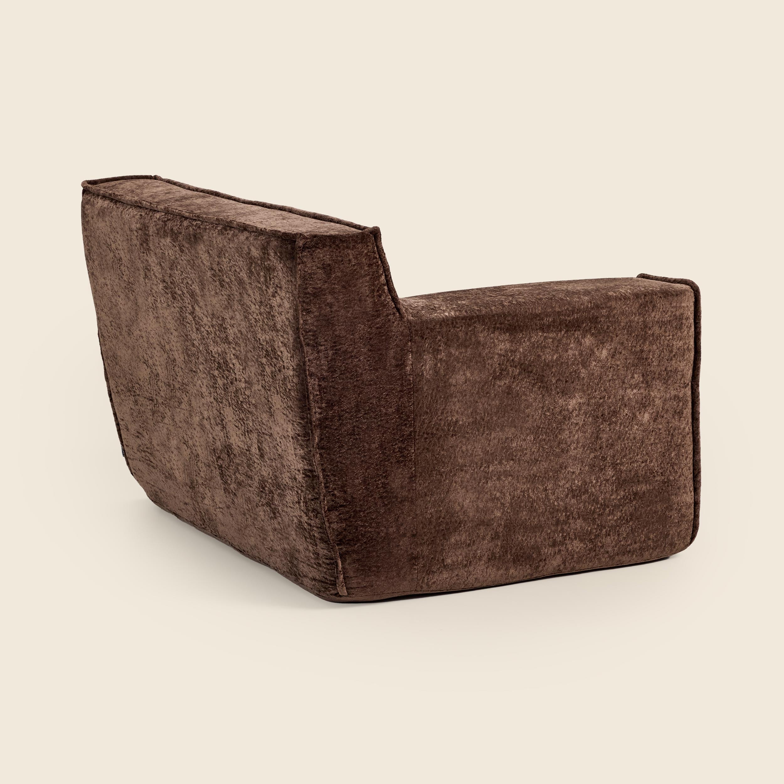 Brown textured armchair on a beige background