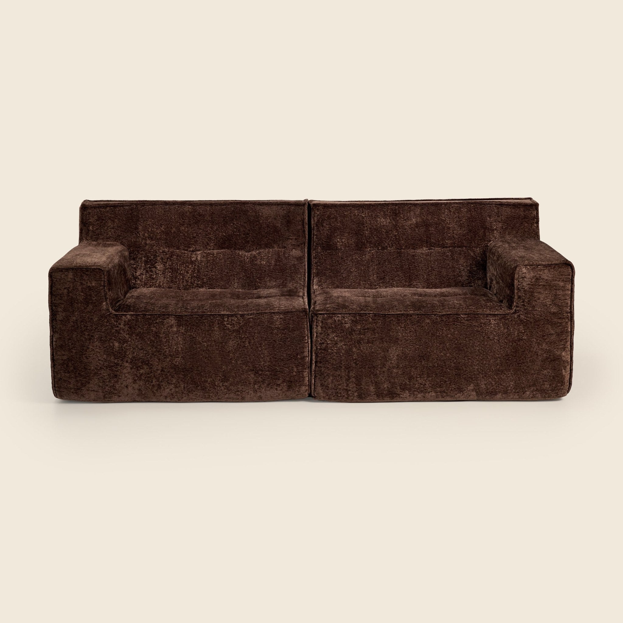 Brown sofa on a beige background