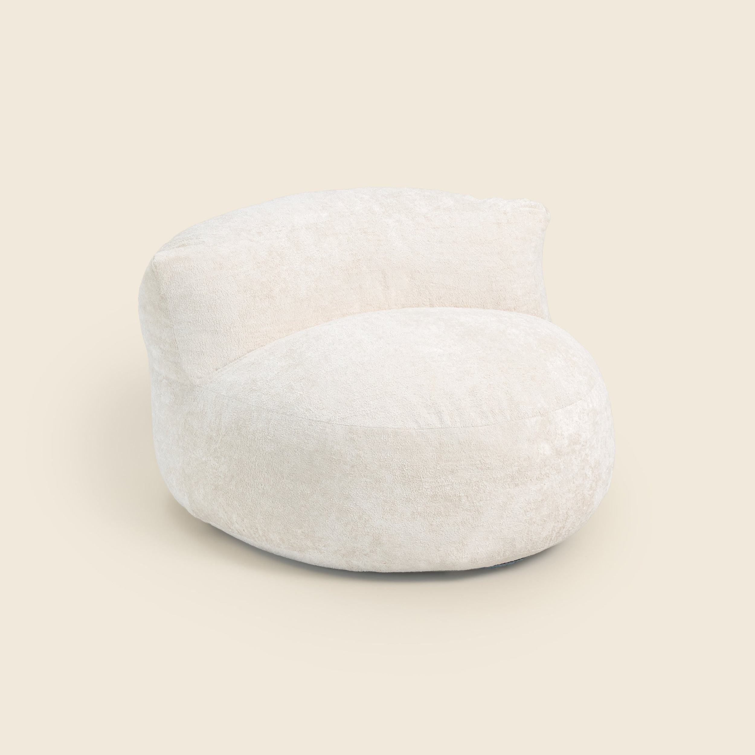White bean bag chair on a beige background