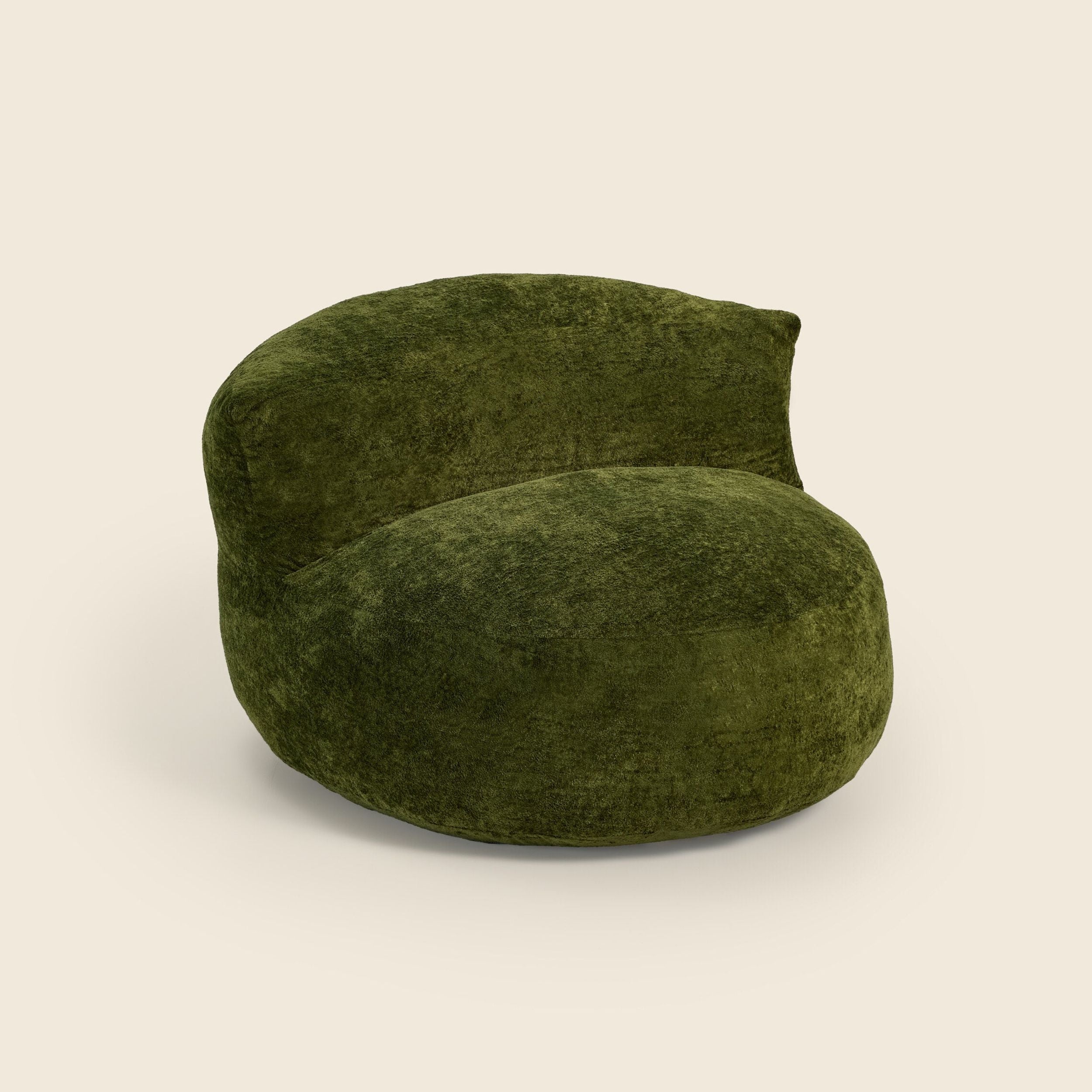 Green textured chair on a beige background