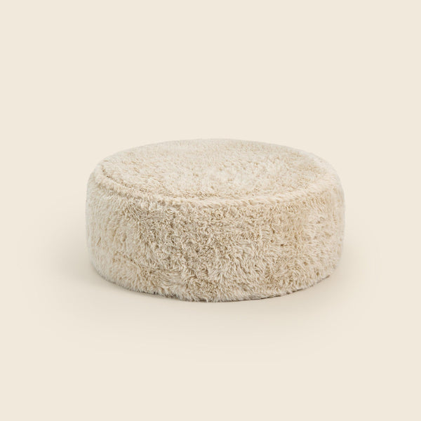 Tootsi Round Ottoman in Cream Faux Fur