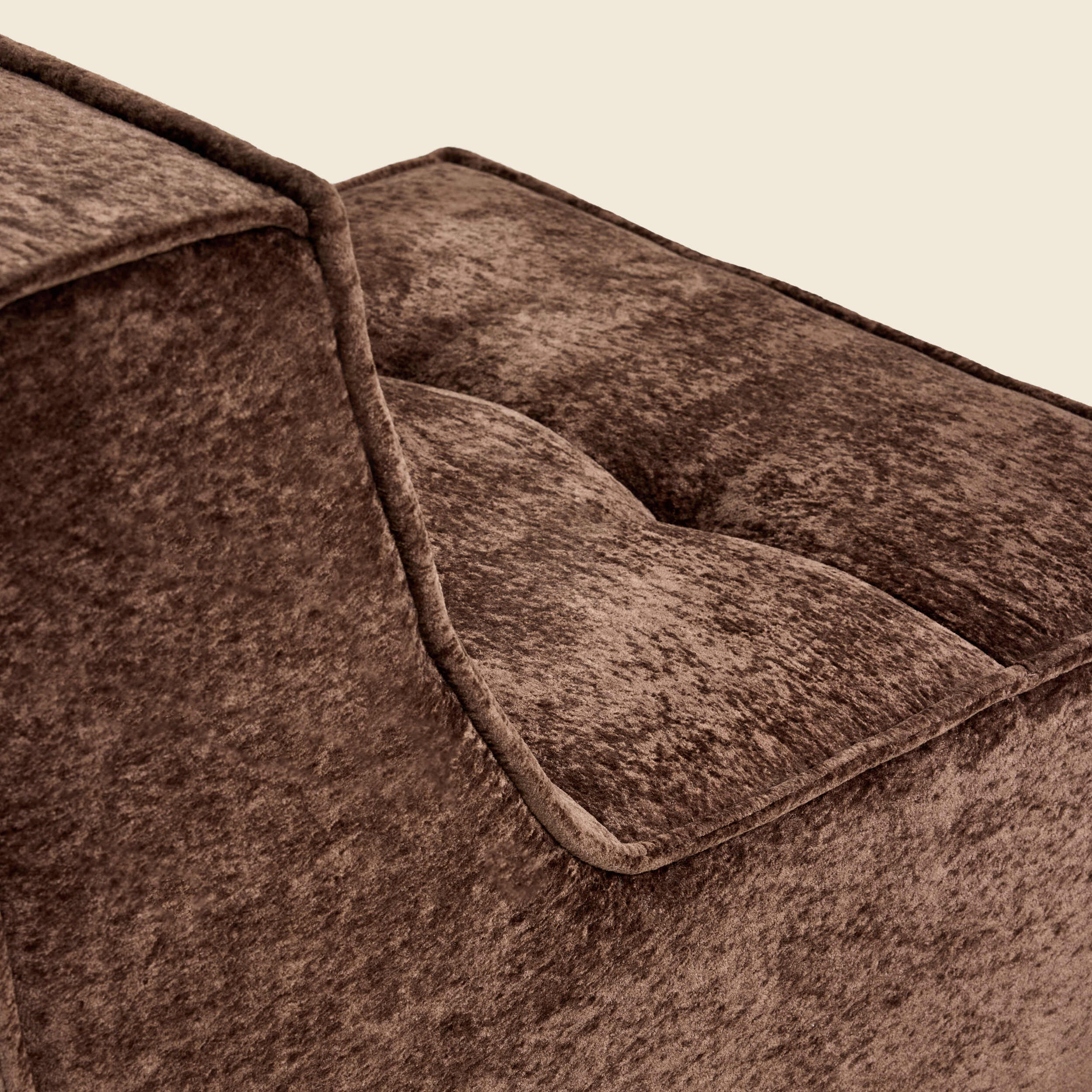 Close-up of brown snow velvet fabric on the Loungi modular chair