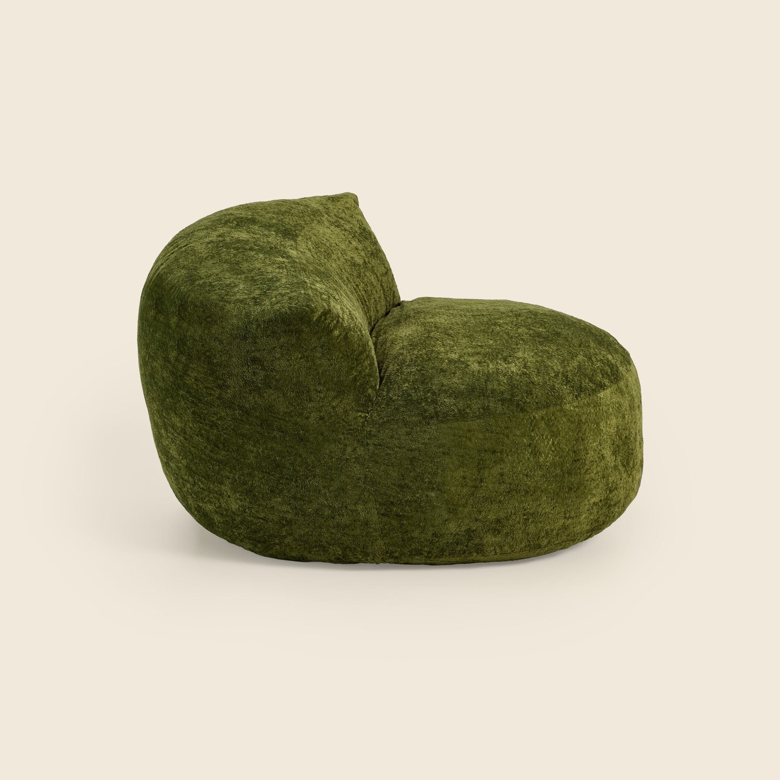 Green textured chair on a beige background