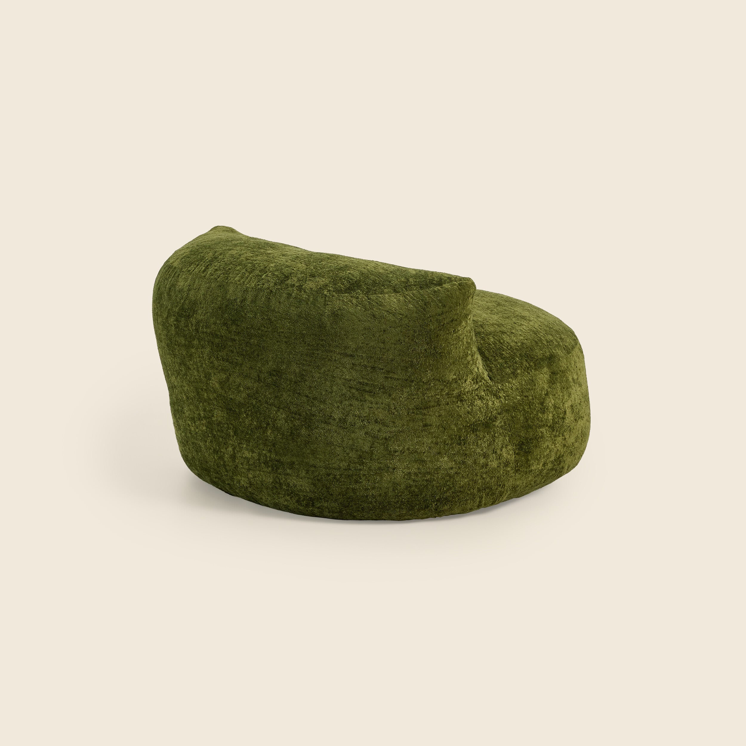 Green textured chair on a beige background