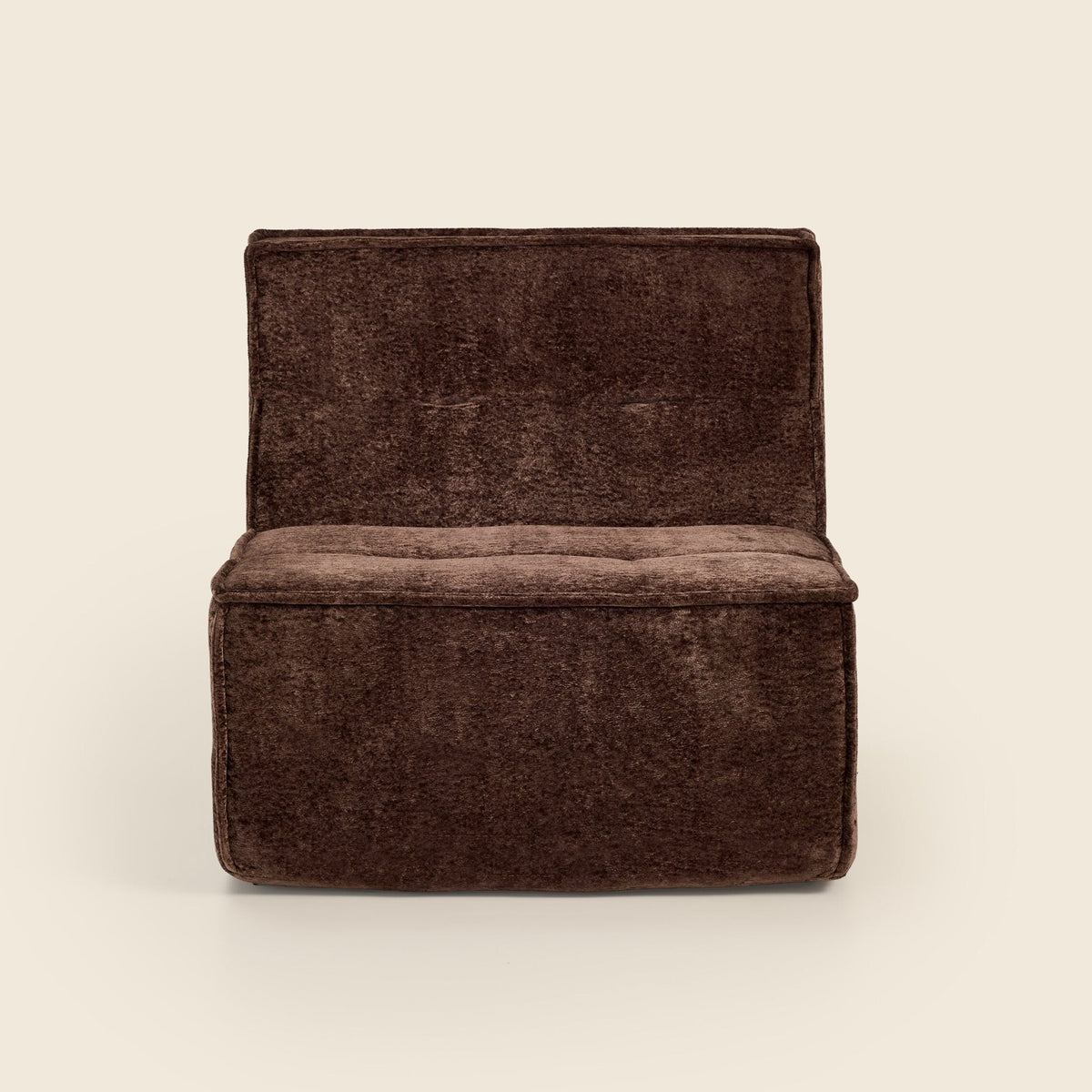 Brown snow velvet Loungi Occasional Chair, angled view on a beige background