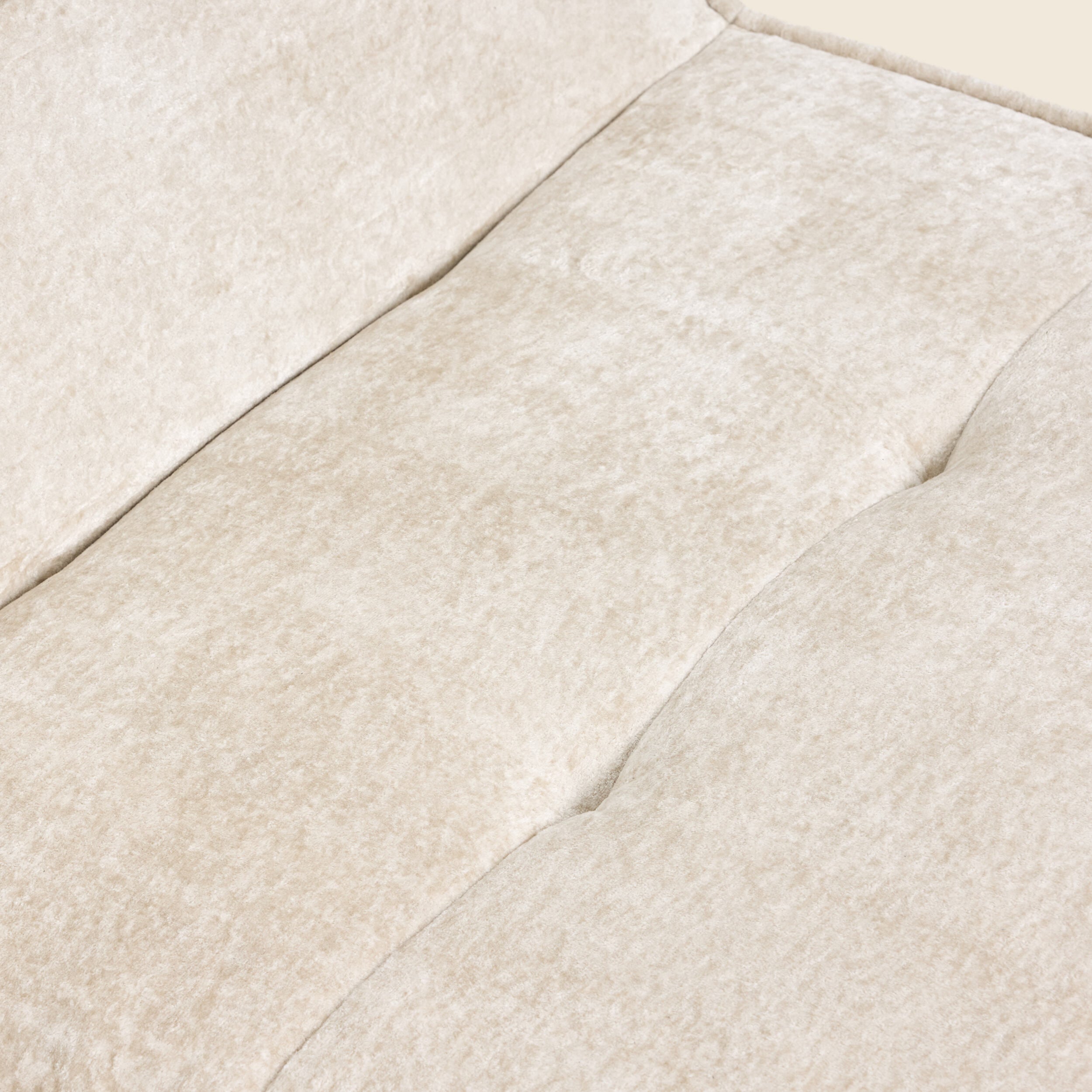 Oat snow velvet Loungi modular chair, back view on a beige background