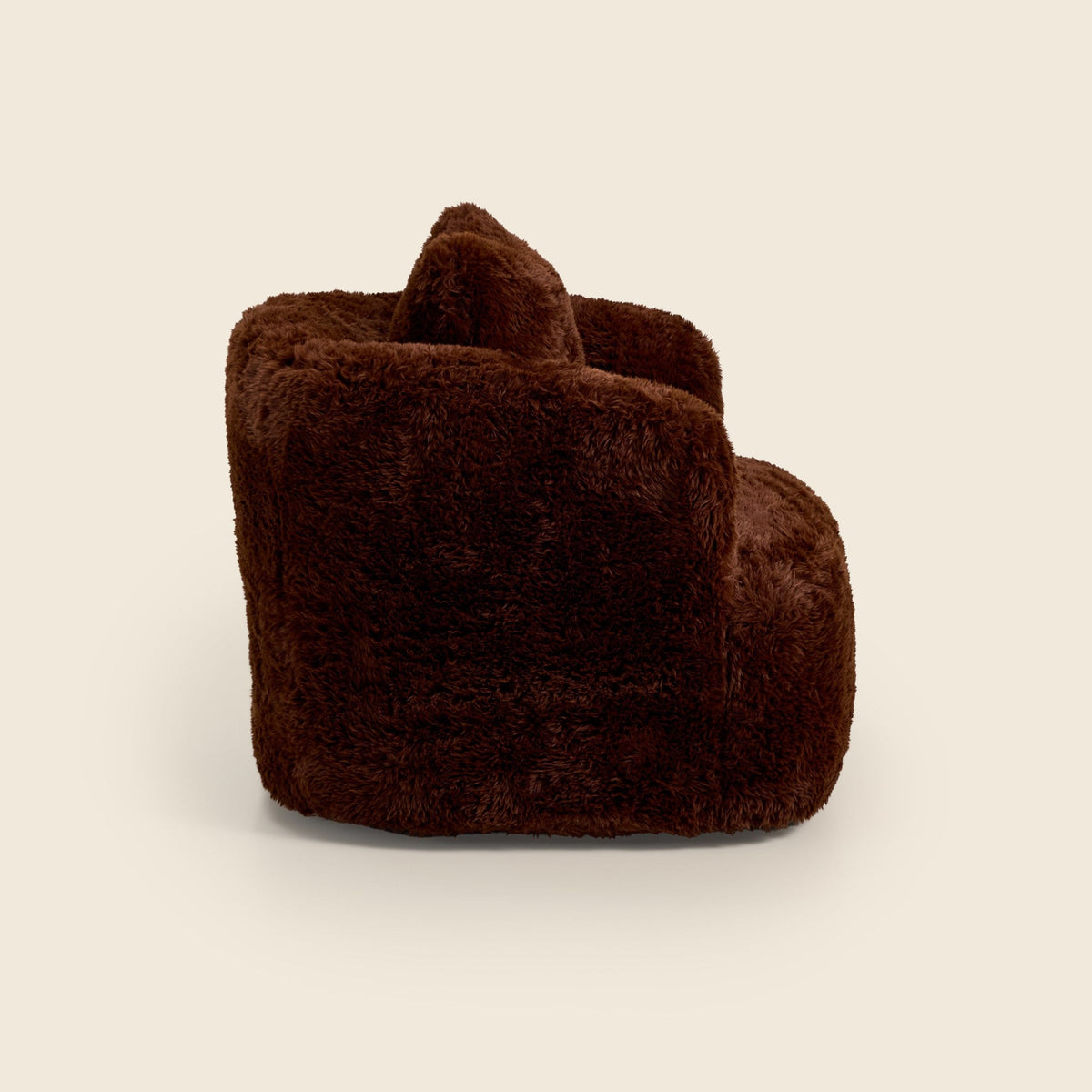 Brown faux fur Peachi Swivel Chair, alternate view on a beige background