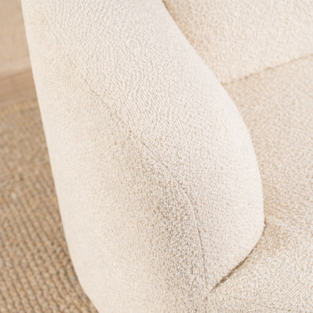 Close-up of a textured beige carpet with a soft, plush surface.