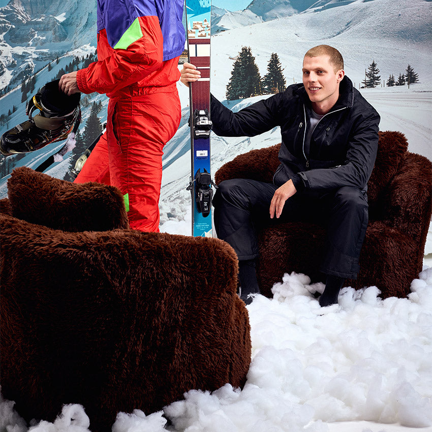 Peachi Brown Swivel Chair - Models Shot in the snow