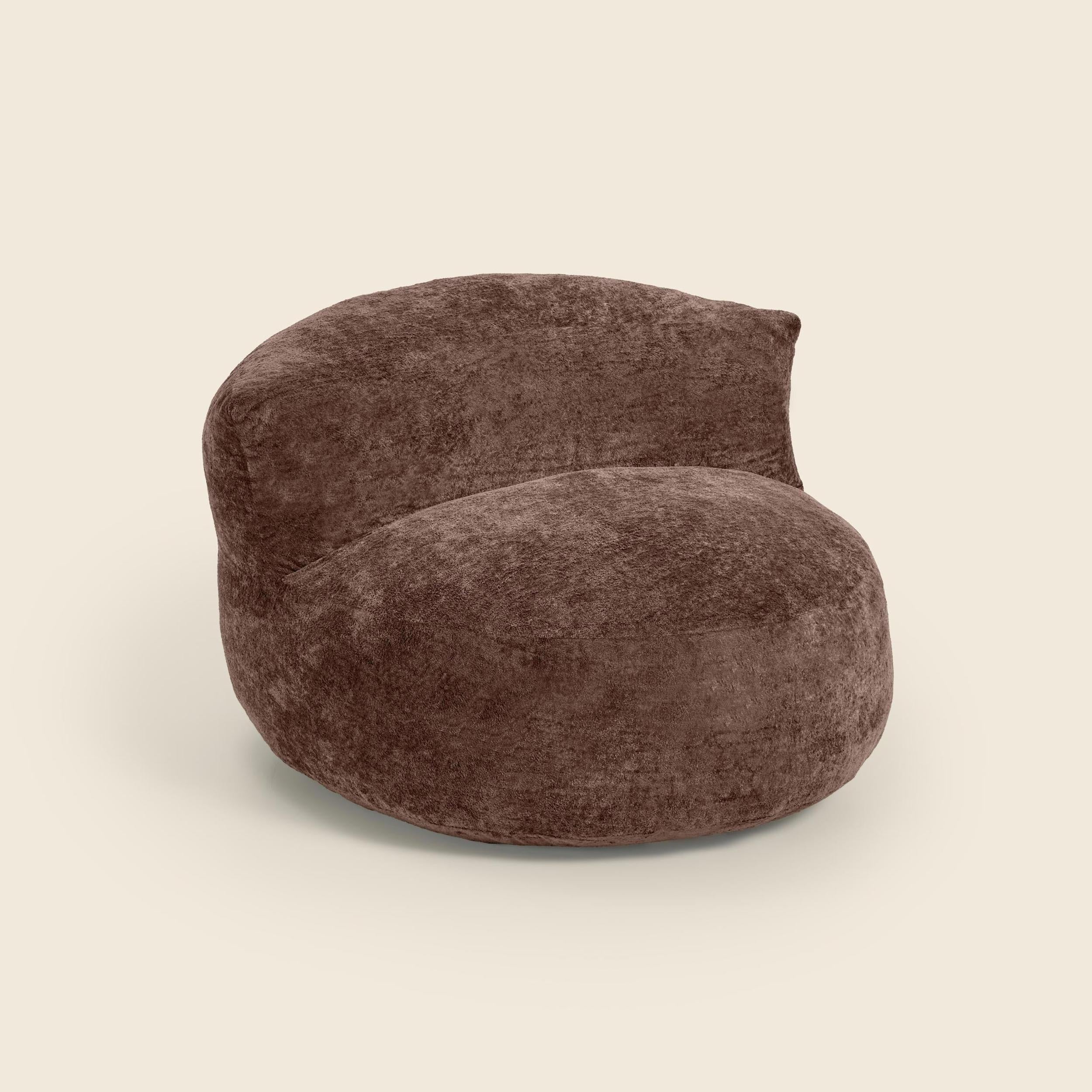 Brown textured bean bag chair beige background