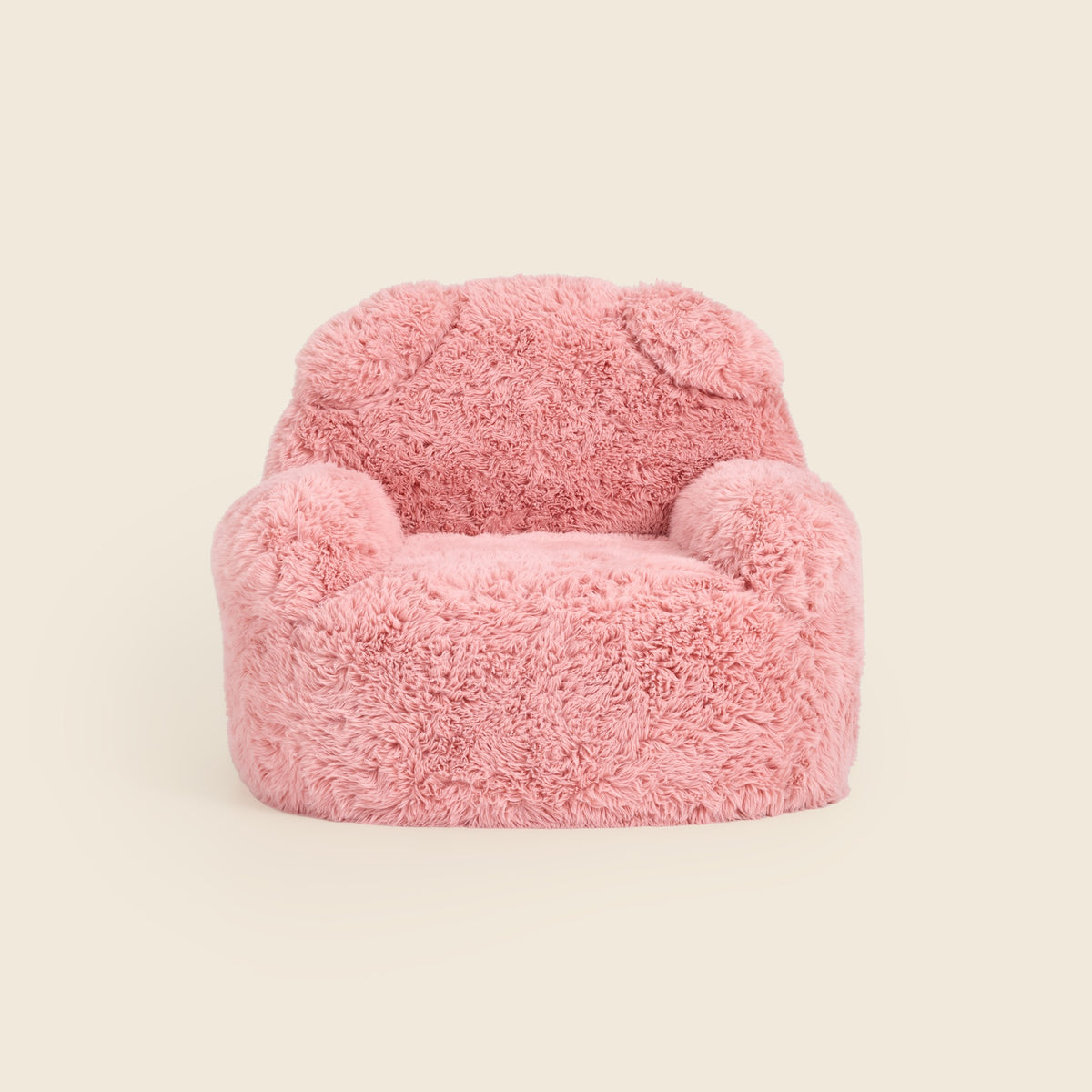 Pink Beari Kids Armchair with bear ears, front view on a beige background