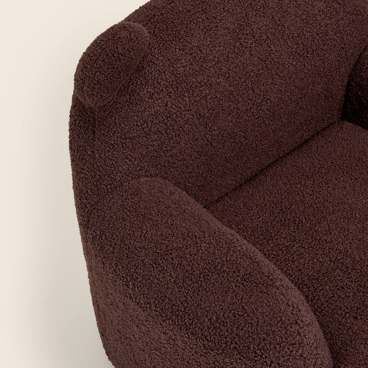 Close-up of the brown Teddi Kids Armchair seat, arm and ears