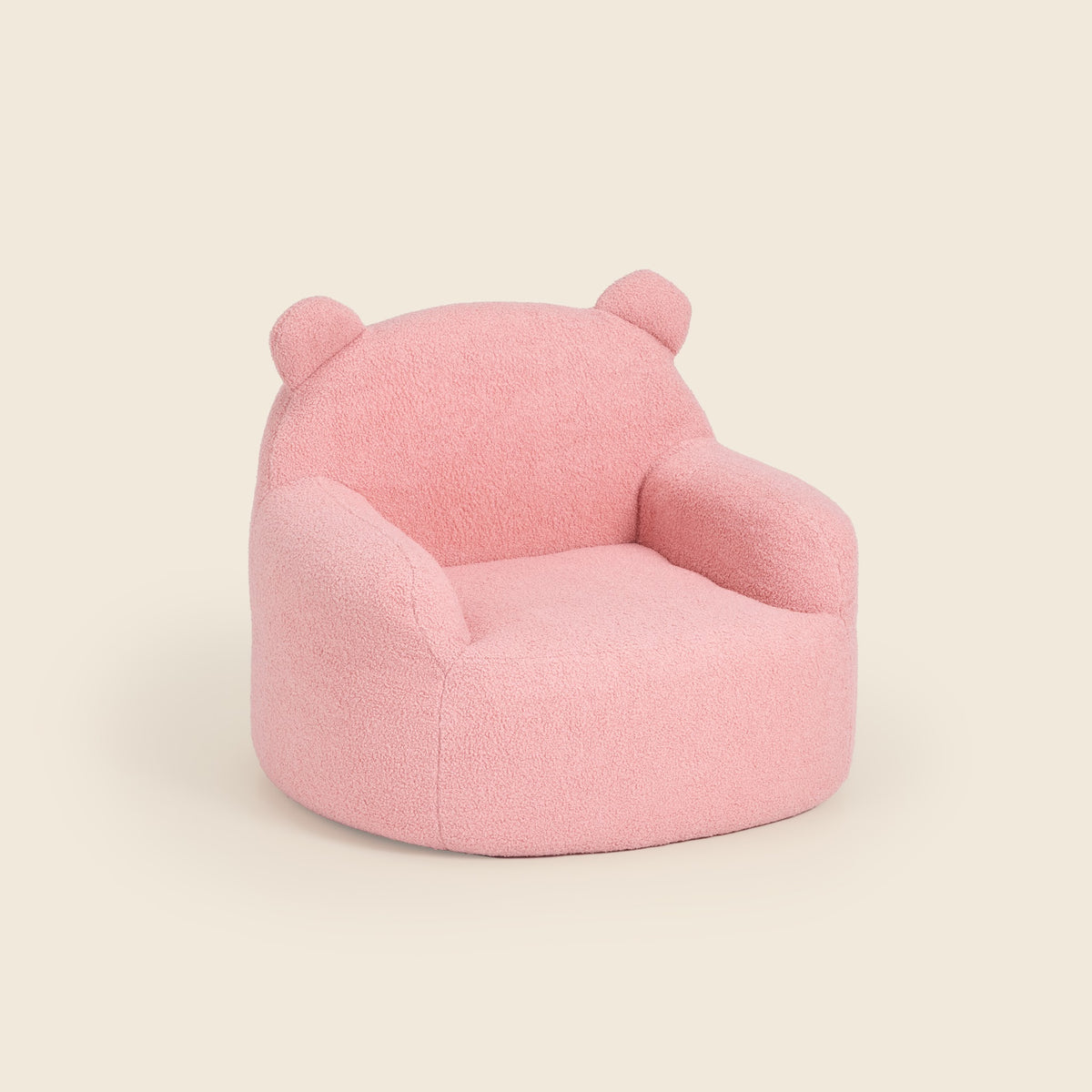Pink Teddi Kids Armchair, three-quarter front view on a beige background