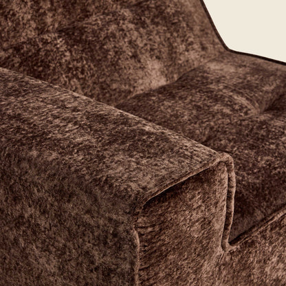 Close-up of brown snow velvet fabric on the Loungi right arm module 