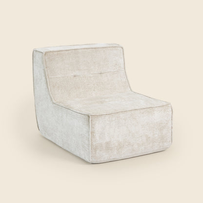Oat snow velvet Loungi modular chair on a beige background 