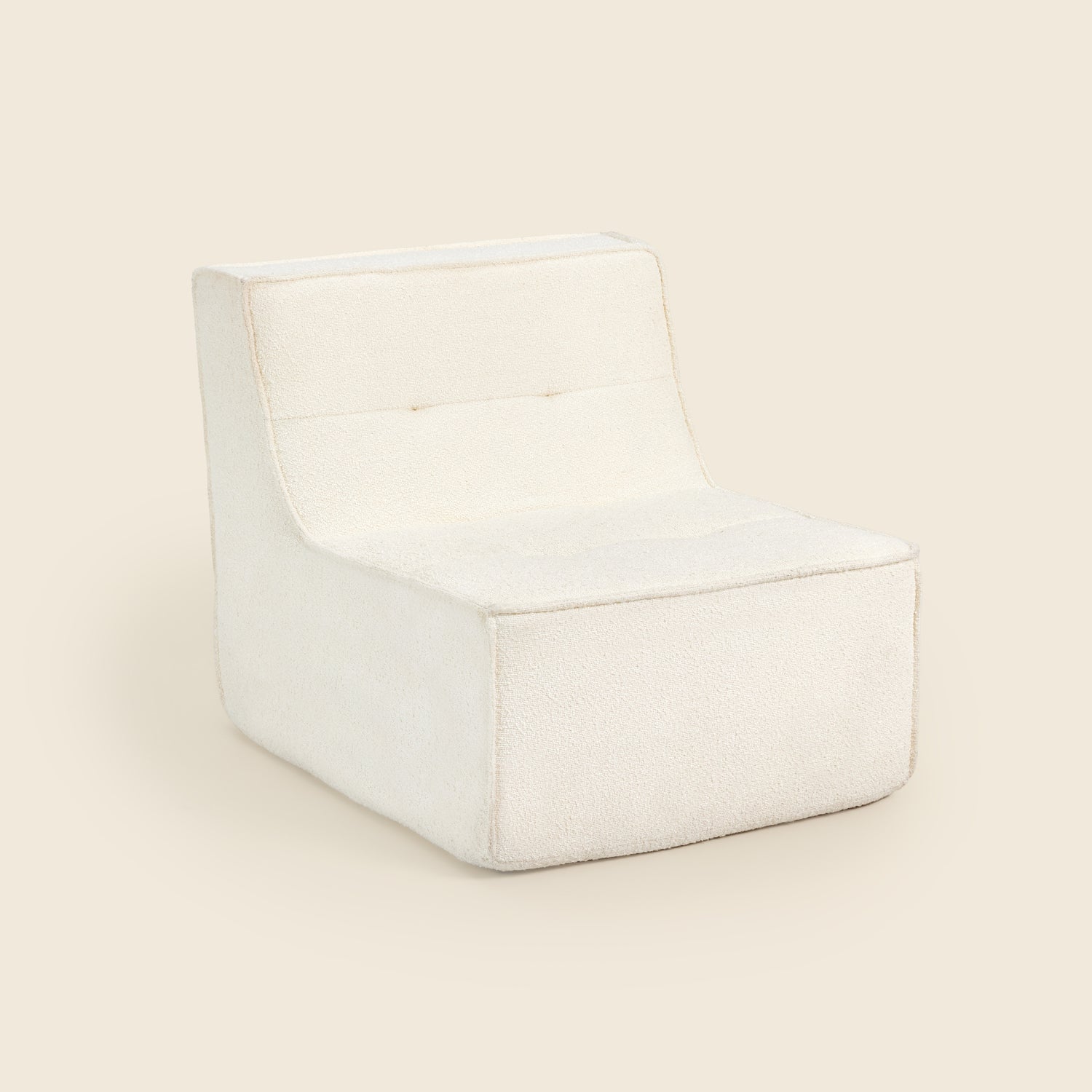 Ivory boucle Loungi modular chair on a beige background #color_ivory-boucle