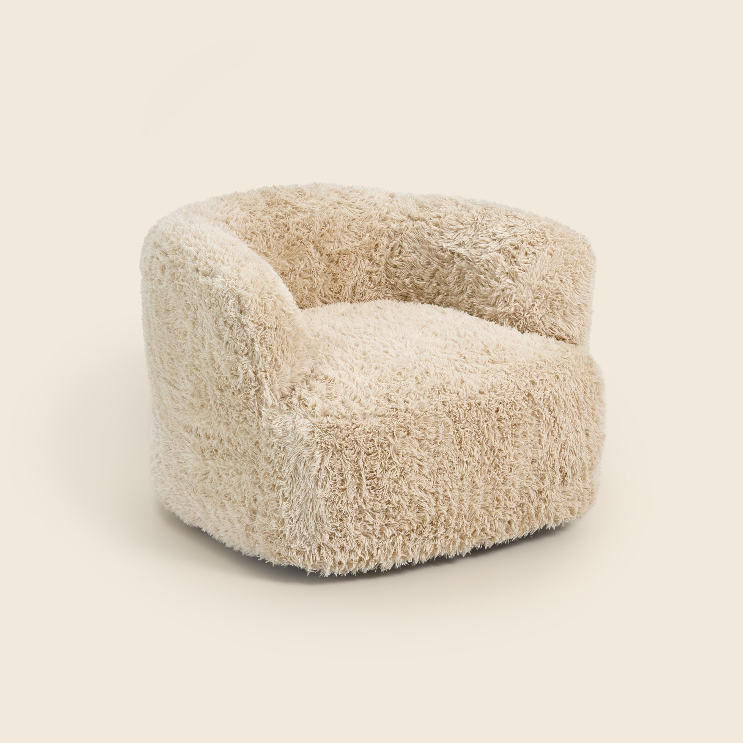 Beige fluffy armchair on a light beige background
