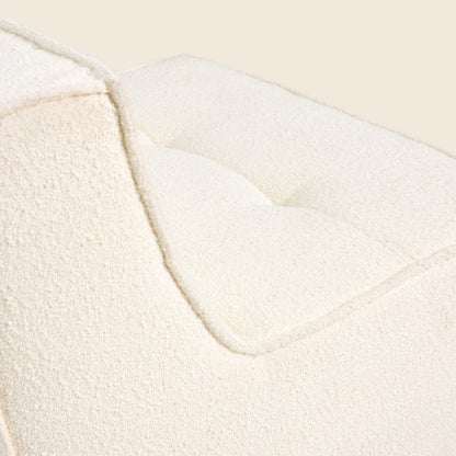 Close-up of ivory boucle fabric on the Loungi modular chair 