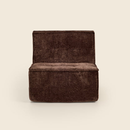 Brown snow velvet Loungi modular chair, angled view on a beige background 