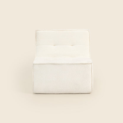 Ivory boucle Loungi modular chair, angled view on a beige background 
