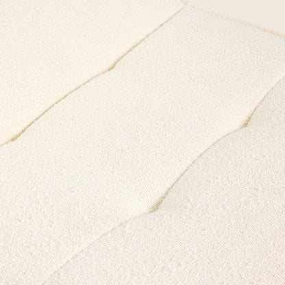 Ivory boucle Loungi modular chair, back view on a beige background 