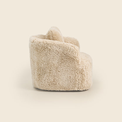 Side of a beige fluffy armchair on a beige background 
