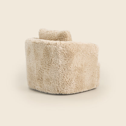 Beige fluffy armchair on a beige background 