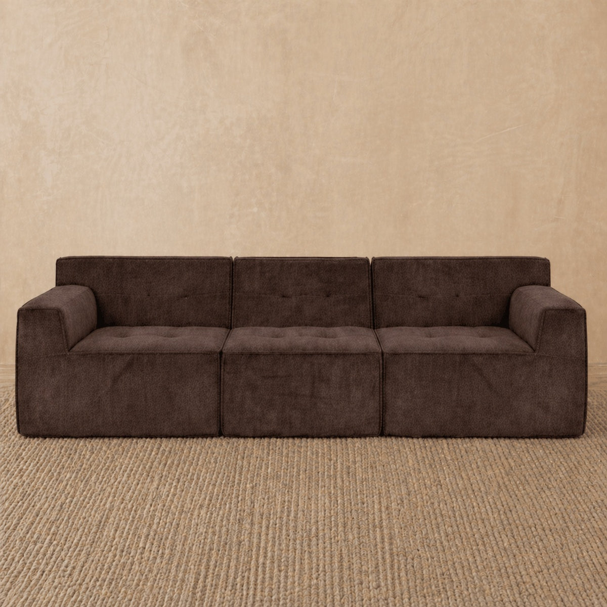 Brown Loungi three-piece modular sofa in an L-shape in a small living room