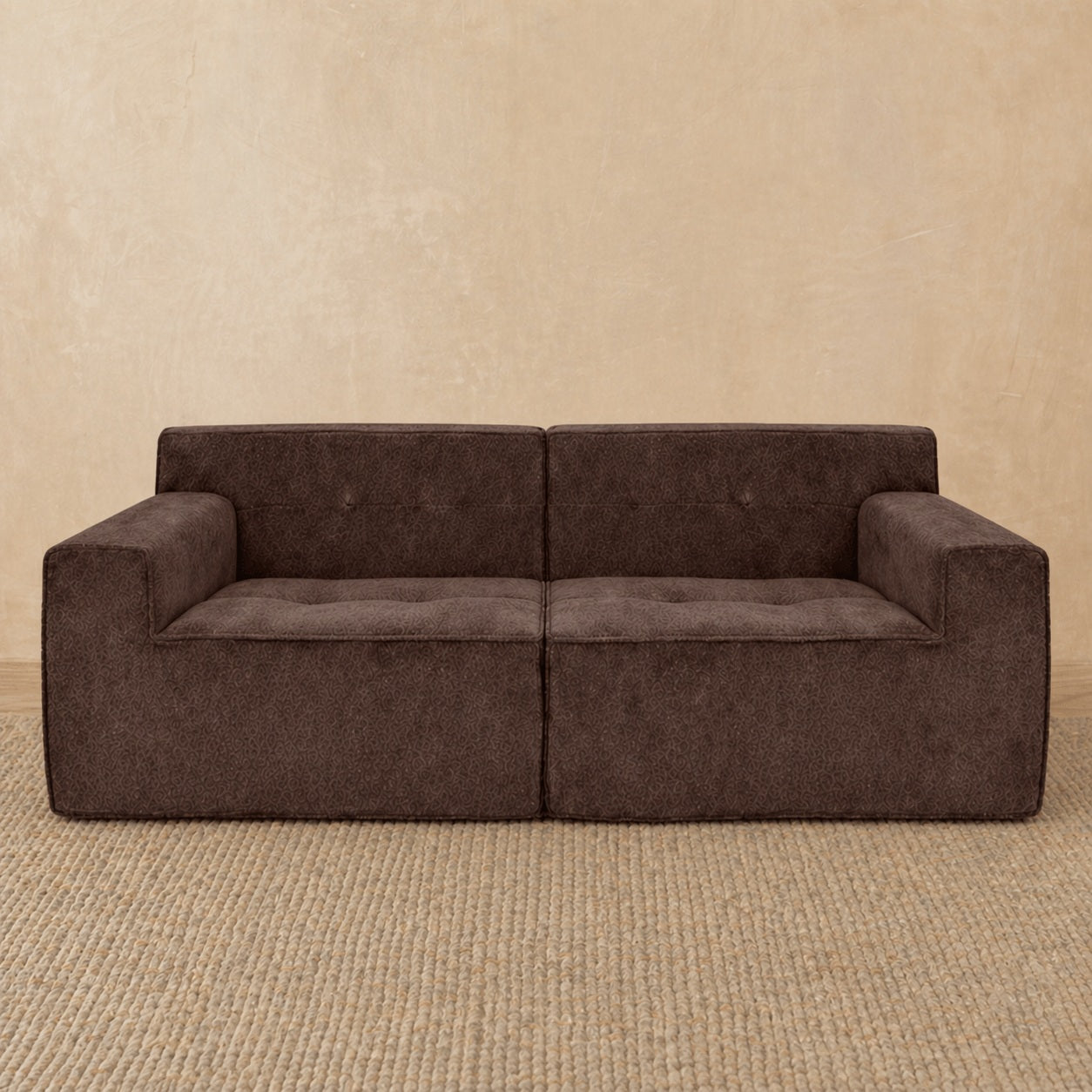 Brown sofa against a beige wall #color_2-piece