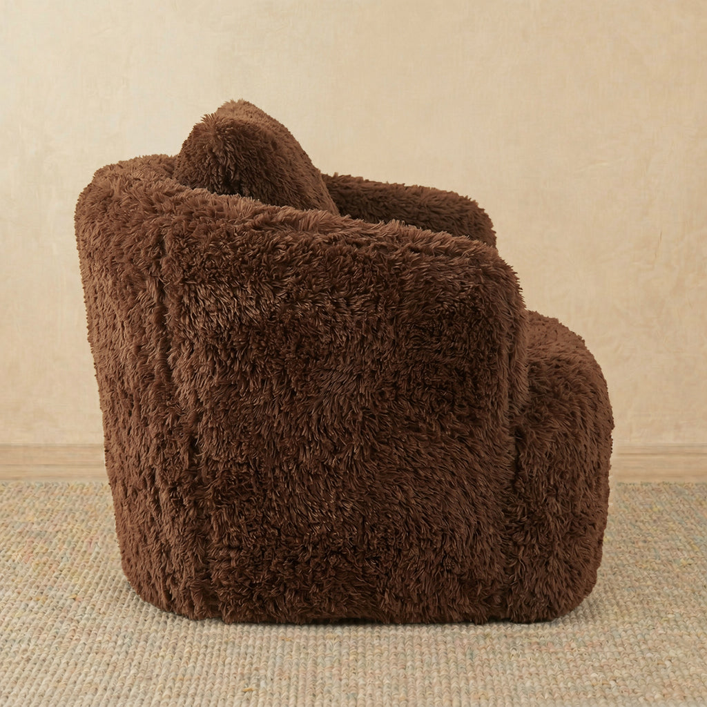 Brown fluffy chair on a beige carpet with a beige wall background 