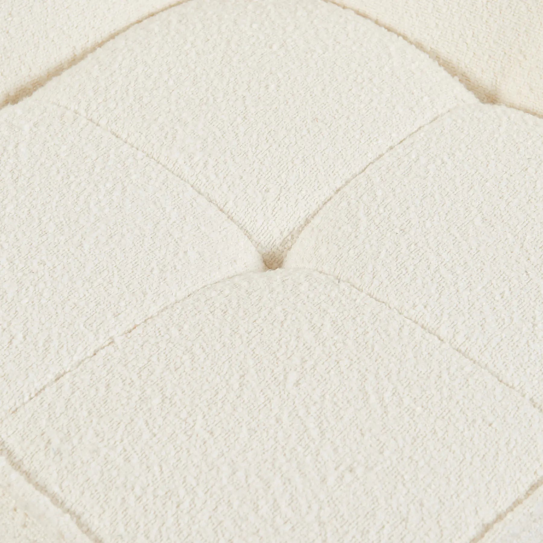 Close-up of a textured white fabric surface [color: ivory-boucle]
