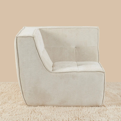Beige armchair on a beige carpet with a beige wall background [color: oat-snow-velvet]