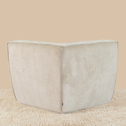 Beige corner cushion on a beige background [color: oat-snow-velvet]