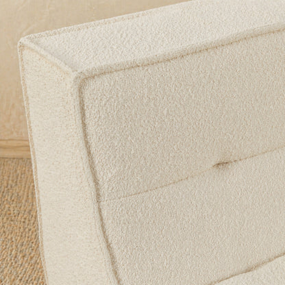 Close-up of a textured beige fabric surface 
