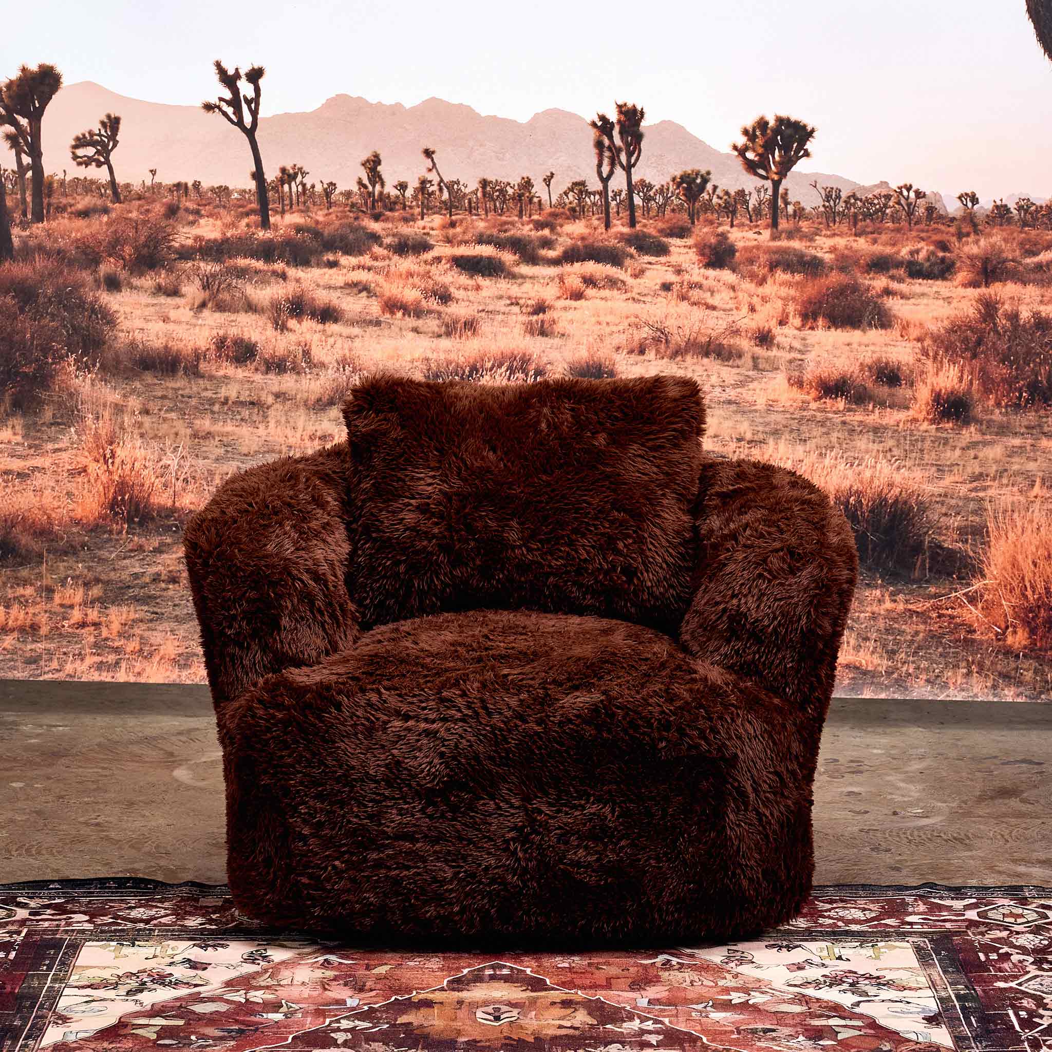 Peachi Brown Swivel Chair - Hero Shot in the dessert 