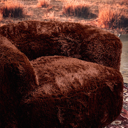 Peachi Brown Swivel Chair - Side Shot in the dessert 