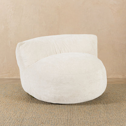 White bean bag chair on a beige background 