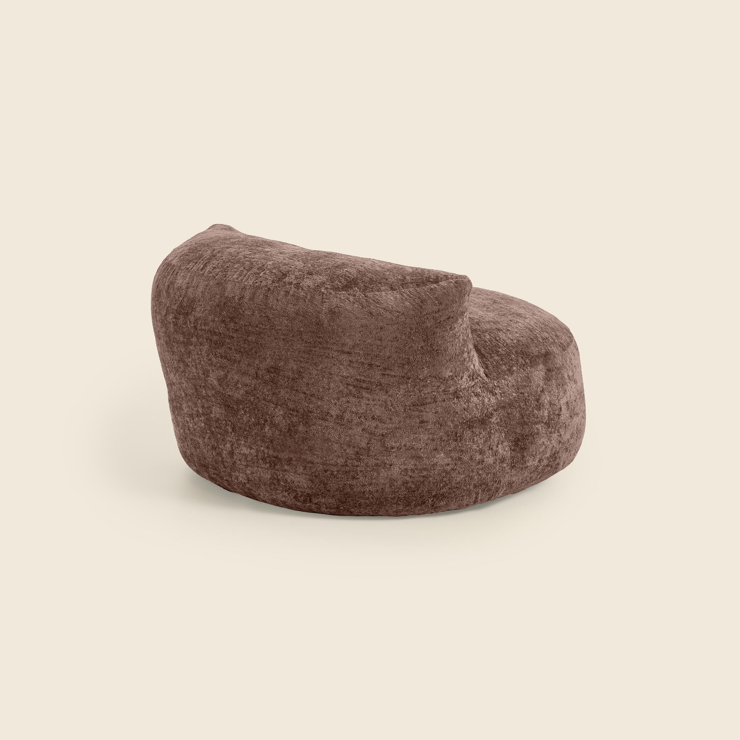 Brown textured bean bag chair beige background 