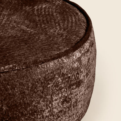Close-up of a textured brown fabric surface
