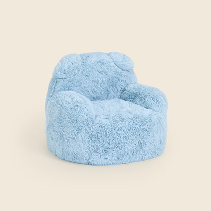 Blue Beari Kids Armchair, three-quarter front view on a beige background 