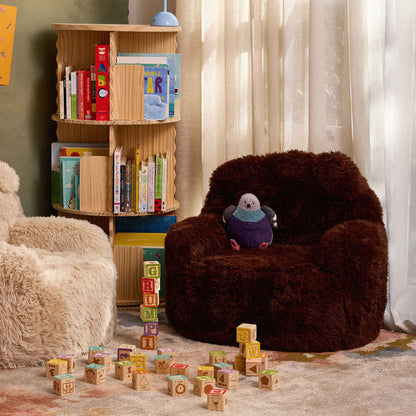 Brown Beari Kids Armchair with a plush toy in a reading nook with wooden toy blocks 