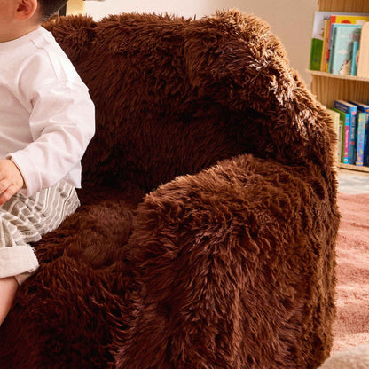 Close-up of the brown faux fur arm and ear of the Beari Kids Armchair 