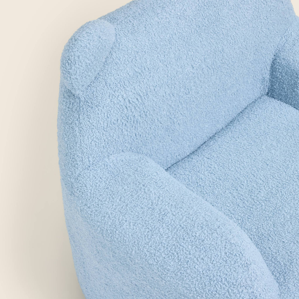 Close-up of the blue Teddi Kids Armchair seat, arm and ears 