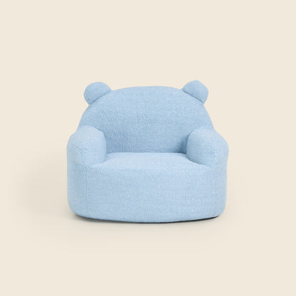 Blue Teddi Kids Armchair with teddy bear ears, front view on a beige background 
