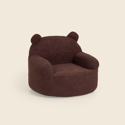 Brown Teddi Kids Armchair, three-quarter front view on a beige background 