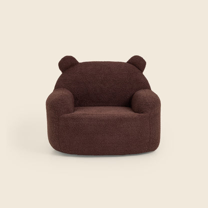Brown Teddi Kids Armchair with teddy bear ears, front view on a beige background 