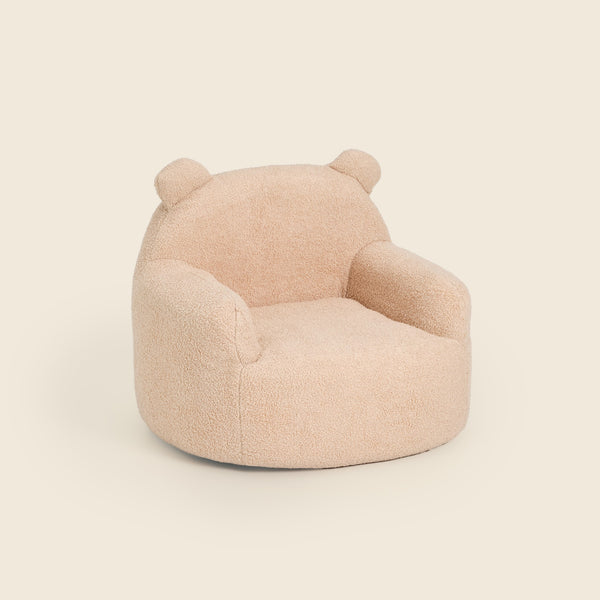Cream Teddi Kids Armchair, three-quarter front view on a beige background #color_cream-teddy